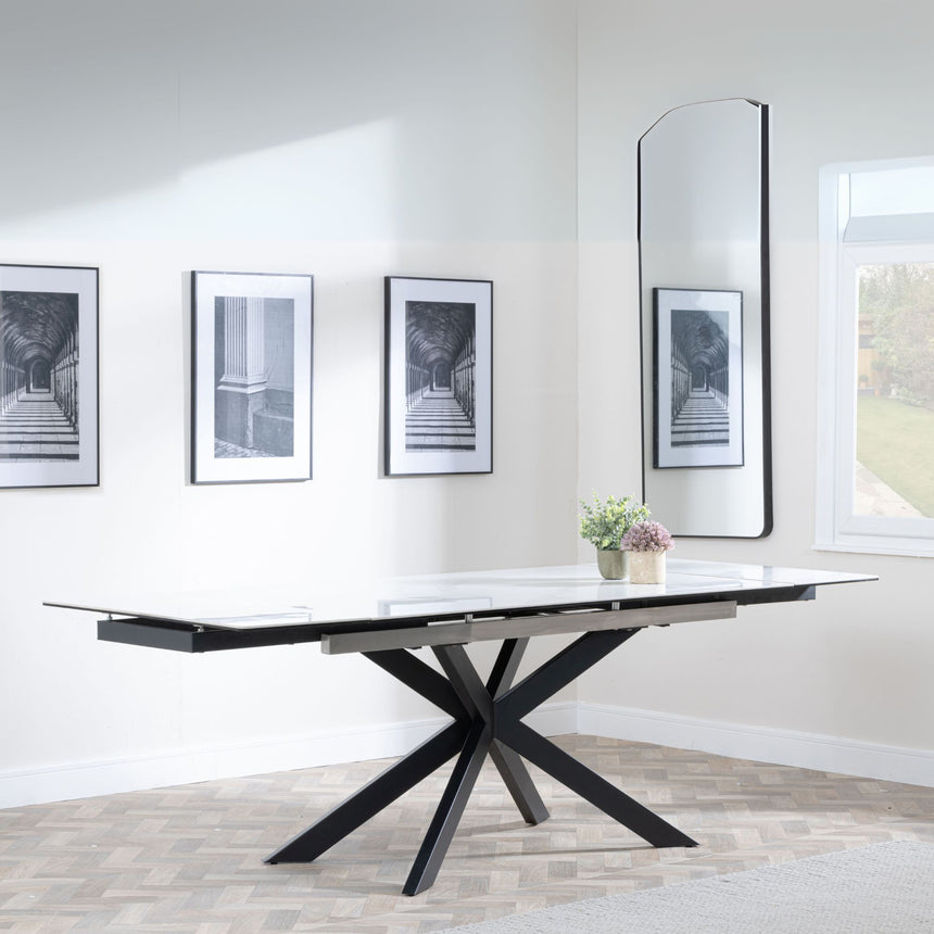 Conley White Ceramic Extending Dining Table with Black Star Base