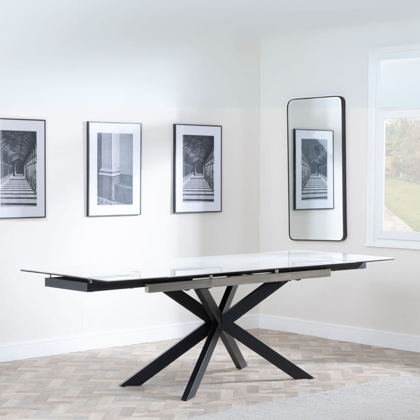 Conley White Ceramic Extending Dining Table with Black Star Base