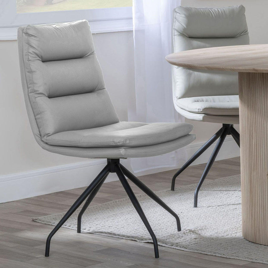 Diego Beige Leather Swivel Dining Chair with Black Legs
