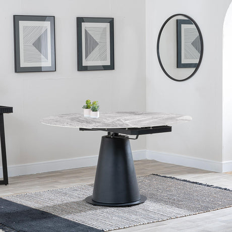 Carrara 4-6 Seater Grey Ceramic Round Swivel Motion Extending Dining Table with Black Pedestal Base - 135cm
