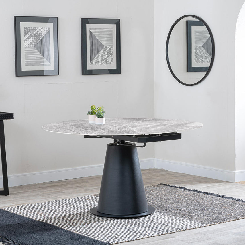 Carrara 4-6 Seater Grey Ceramic Round Swivel Motion Extending Dining Table with Black Pedestal Base - 135cm