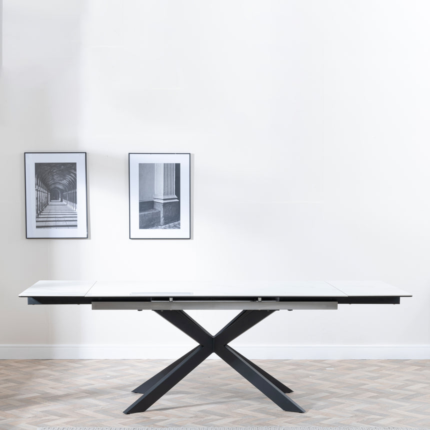 Conley White Ceramic Extending Dining Table with Black Star Base