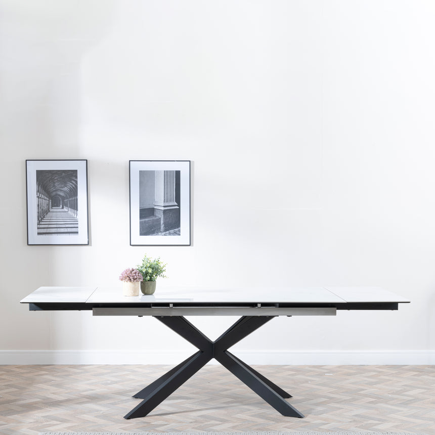 Conley White Ceramic Extending Dining Table with Black Star Base
