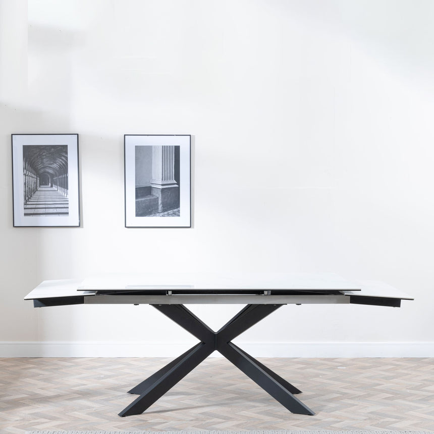 Conley White Ceramic Extending Dining Table with Black Star Base