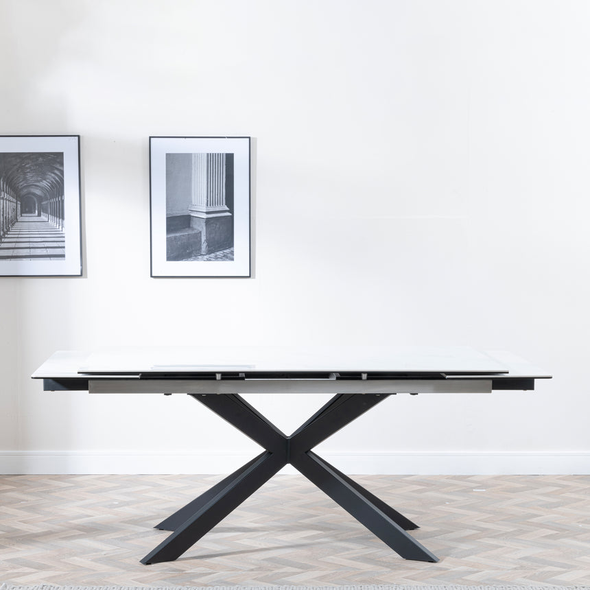Conley White Ceramic Extending Dining Table with Black Star Base