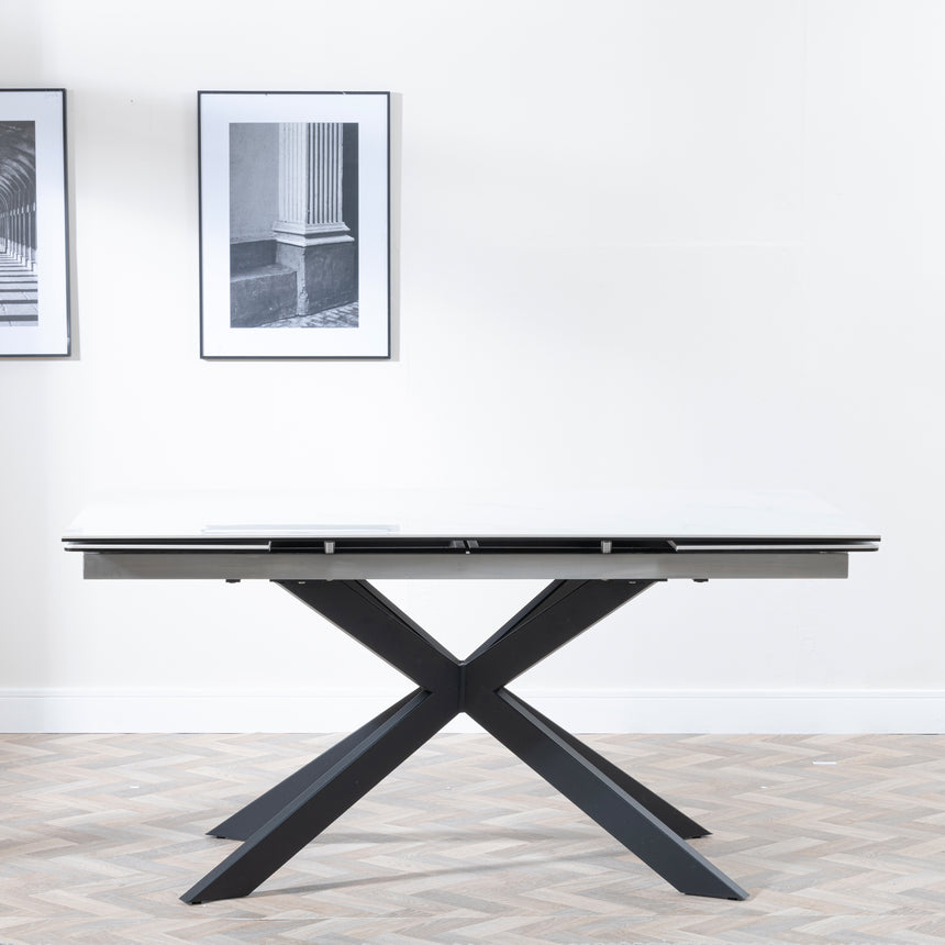 Conley White Ceramic Extending Dining Table with Black Star Base