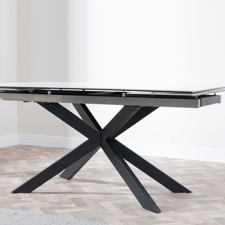 Conley White Ceramic Extending Dining Table with Black Star Base