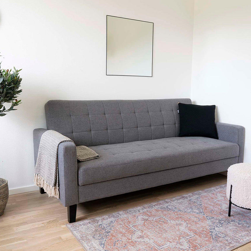 Milton Dark Grey Fabric Click Clack Sofa Bed with Black Legs