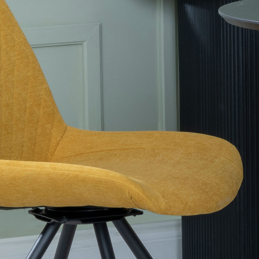 Messina Fabric Swivel Dining Chair with Black Legs