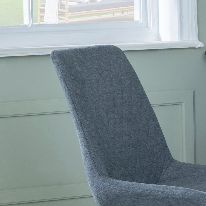 Messina Fabric Swivel Dining Chair with Black Legs