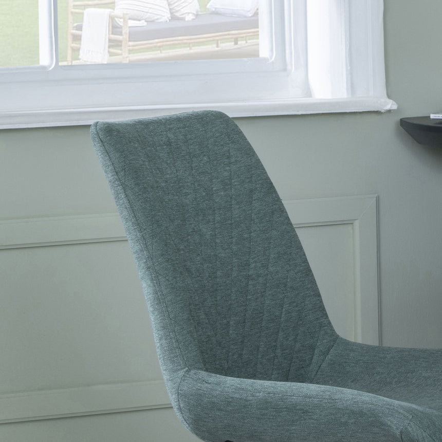 Messina Fabric Swivel Dining Chair with Black Legs