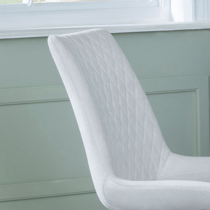 Messina Fabric Swivel Dining Chair with Black Legs