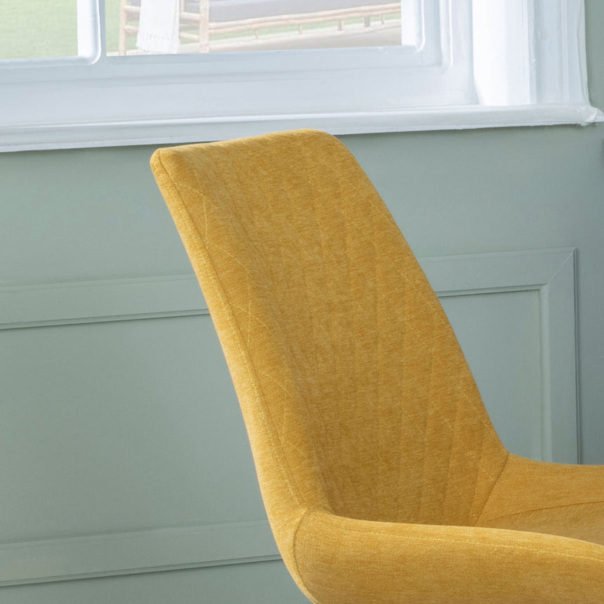 Messina Fabric Swivel Dining Chair with Black Legs