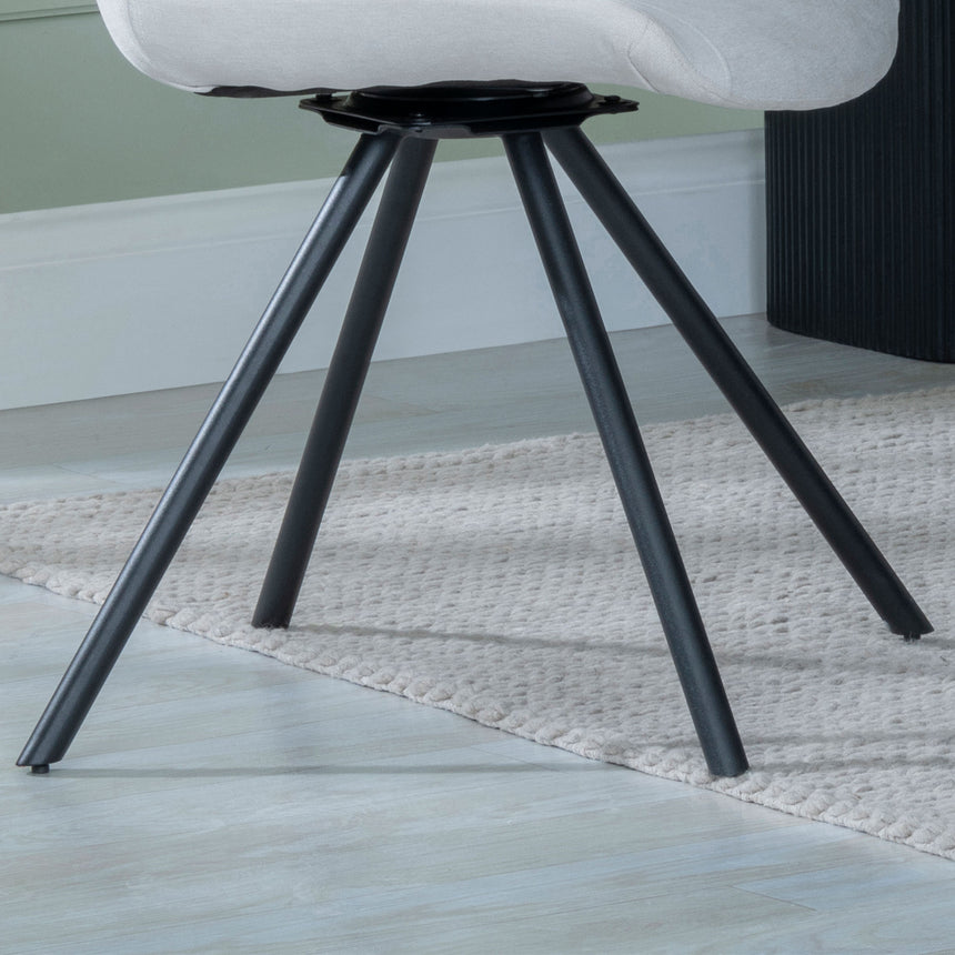 Messina Fabric Swivel Dining Chair with Black Legs