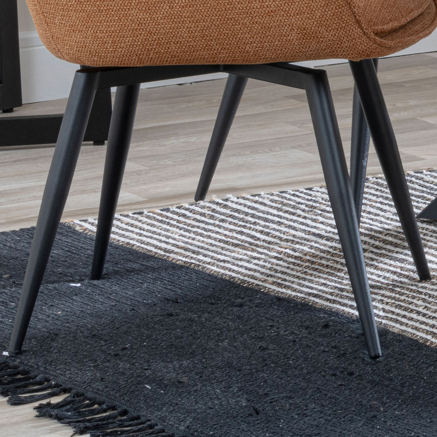 Torres Fabric Swivel Dining Chair with Black Legs