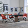 Catalina Black Ceramic Extending Pedastal Dining Set - Ion Orange Velvet Fabric Swivel Dining Chair-3