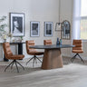 Danetti Dark Grey Ceramic Oval Dining Set with Bronze Pedestal Base - Diego Brown Leather Swivel Dining Chair