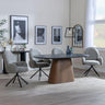 Danetti Dark Grey Ceramic Oval Dining Set with Bronze Pedestal Base - Theo Dark Grey Fabric Swivel Dining Chair-2
