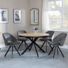 Ezra Oak 4 Seater Round Dining Set with Black Spider Legs - 4 Ion Dark Grey Velvet Fabric Swivel Dining Chair