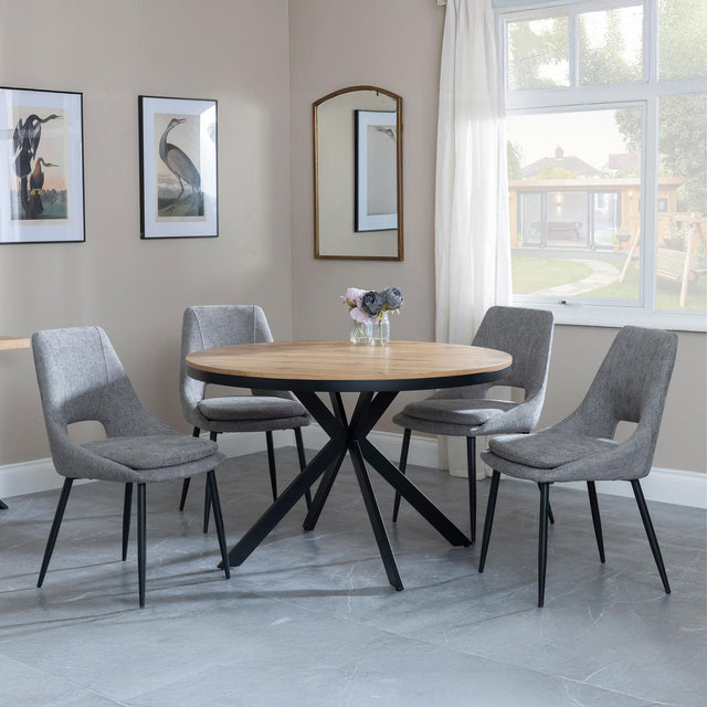 Ezra Oak 4 Seater Round Dining Set with Black Spider Legs - 4 Peyton Grey Fabric Dining Chair