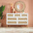 Croxley White and Rattan 7 Drawer Wide Chest