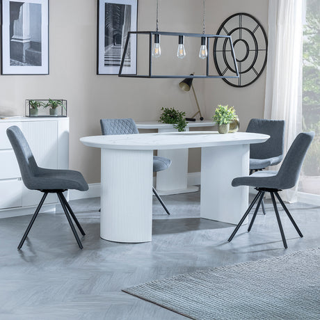 Chadwell White Marble Effect Oval Dining Set - Messina Fabric Swivel Dining Chair