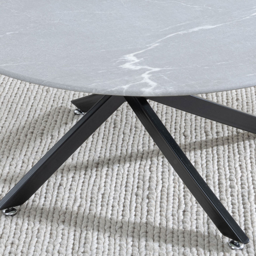 Ashley Glass Round Coffee Table with Black Metal Chopstick Legs