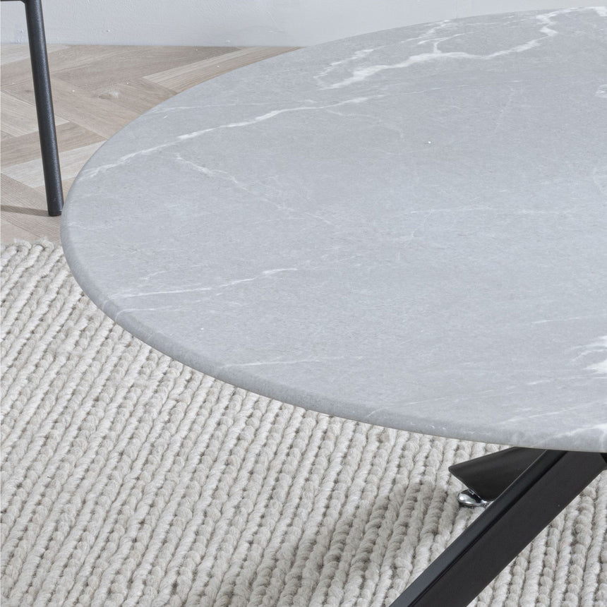 Ashley Glass Round Coffee Table with Black Metal Chopstick Legs