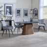 Joyce Dark Grey  Ceramic Oval Dining Set with Pedestal Base - Torres Fabric Swivel Dining Chair