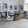 Joyce Dark Grey  Ceramic Oval Dining Set with Pedestal Base - Tuscany Leather Swivel Dining Chair