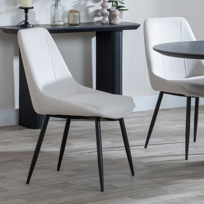 Joyce Dark Grey  Ceramic Oval Dining Set with Pedestal Base - Rovereto Fabric Dining Chair