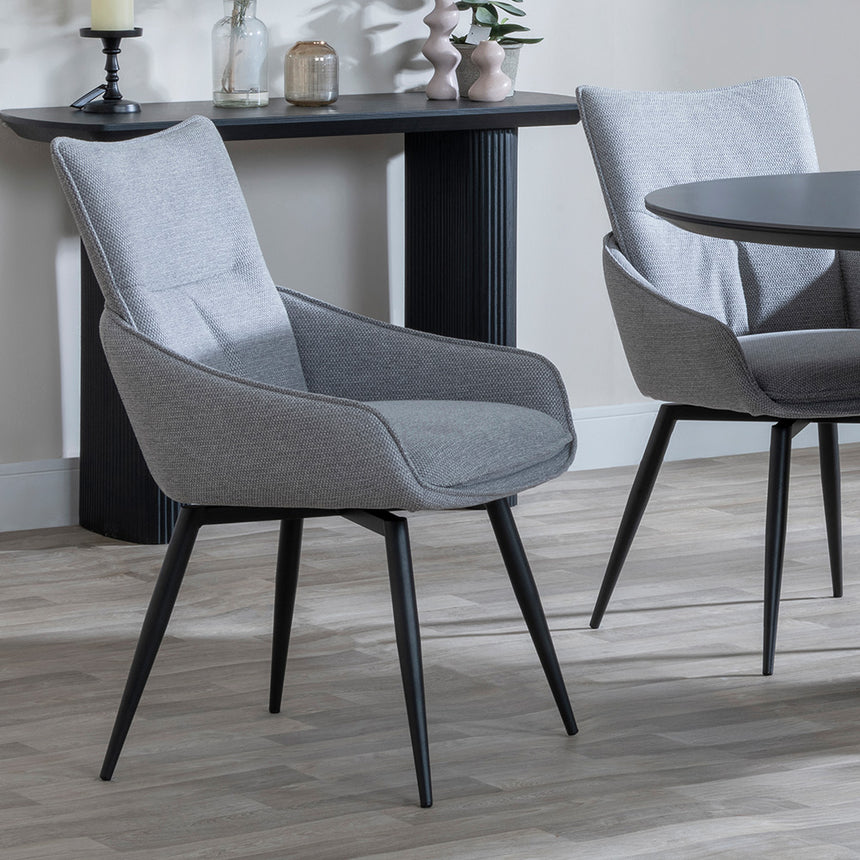 Joyce Dark Grey  Ceramic Oval Dining Set with Pedestal Base - Torres Fabric Swivel Dining Chair