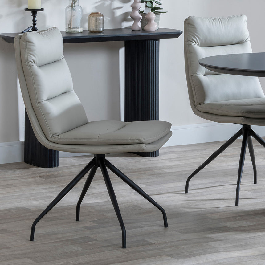 Joyce Dark Grey  Ceramic Oval Dining Set with Pedestal Base - Tuscany Leather Swivel Dining Chair