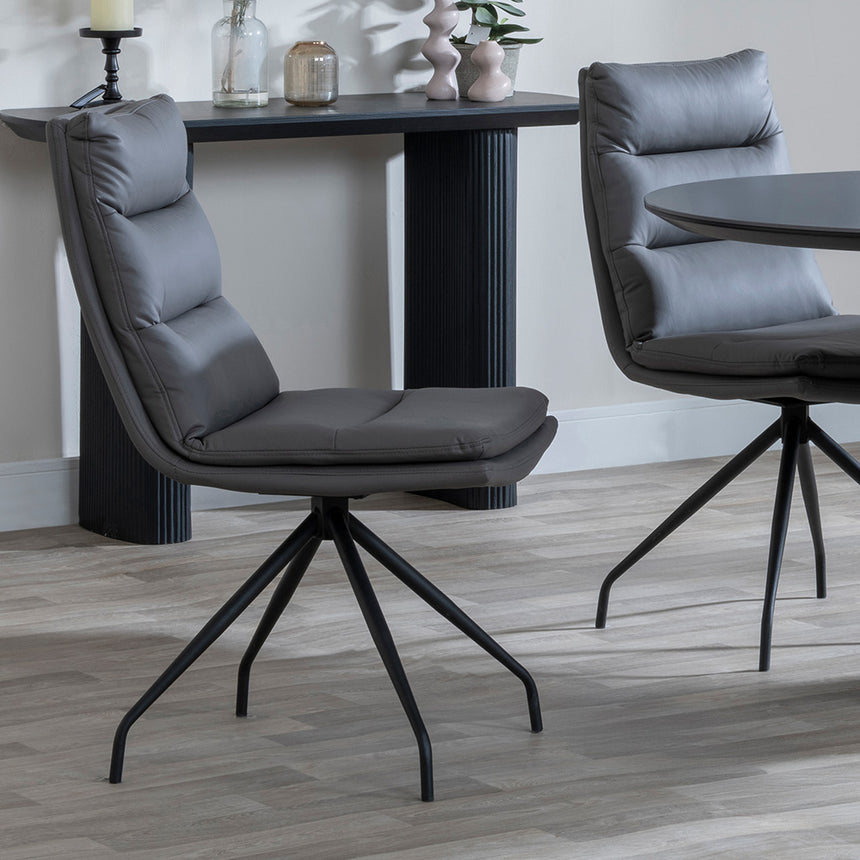 Joyce Dark Grey  Ceramic Oval Dining Set with Pedestal Base - Tuscany Leather Swivel Dining Chair