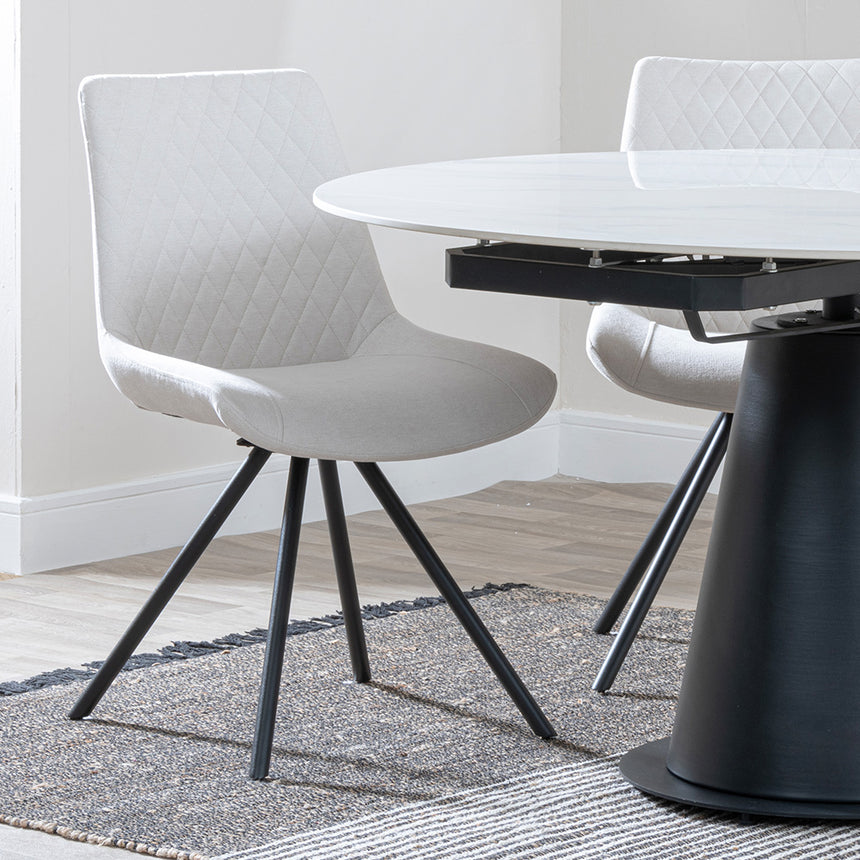 Madison White Ceramic 4 Seater Round Extending Dining Set - Messina Fabric Swivel Dining Chair