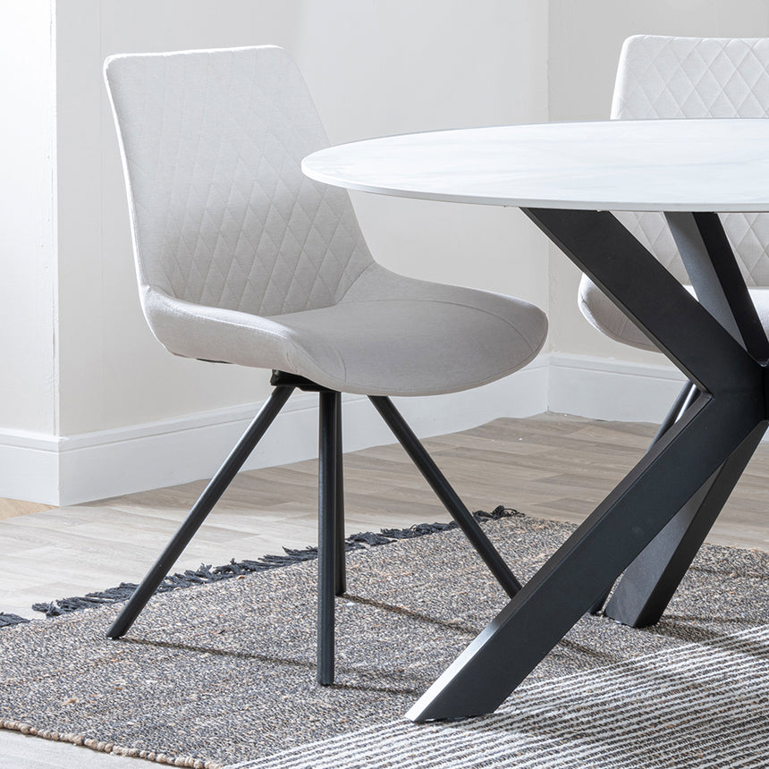 Megan White Ceramic 4 Seater Round Dining Set - Messina Fabric Swivel Dining Chair