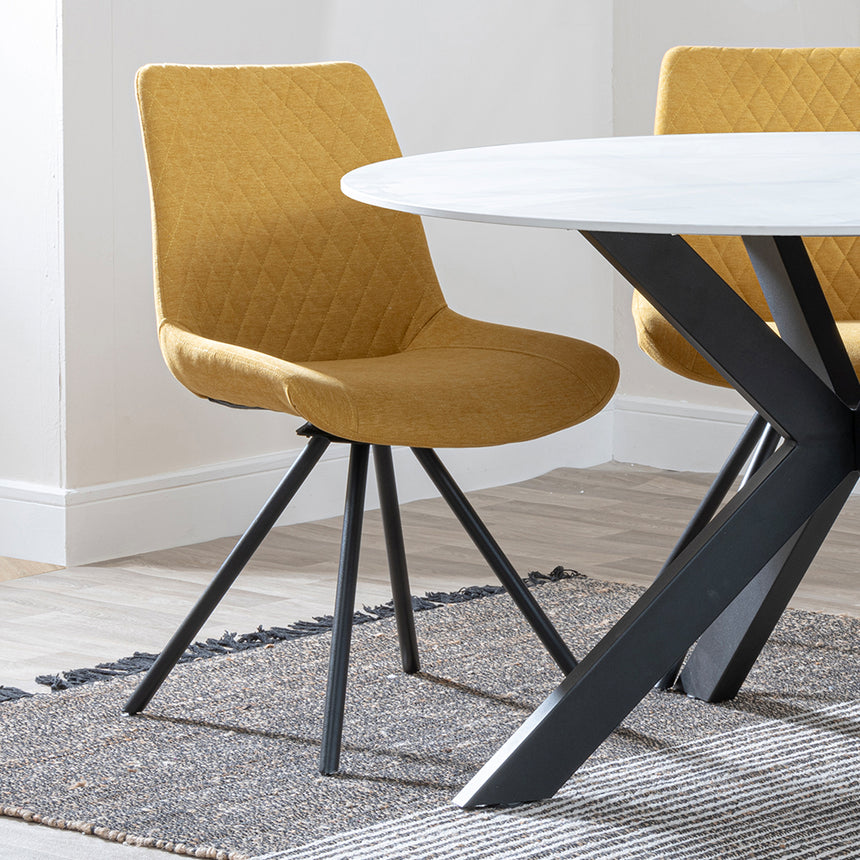 Megan White Ceramic 4 Seater Round Dining Set - Messina Fabric Swivel Dining Chair